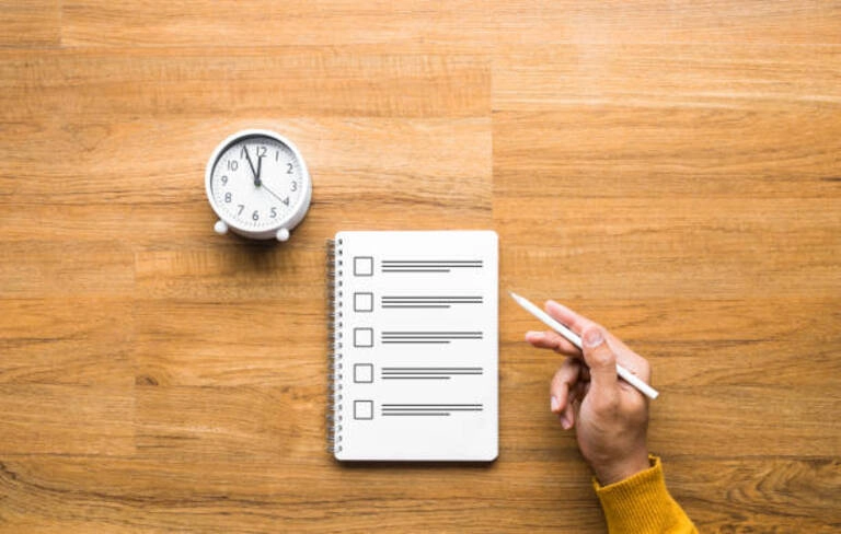 table with clock and checklist. 